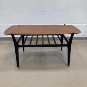A Nathan teak and black two tiered Coffee table