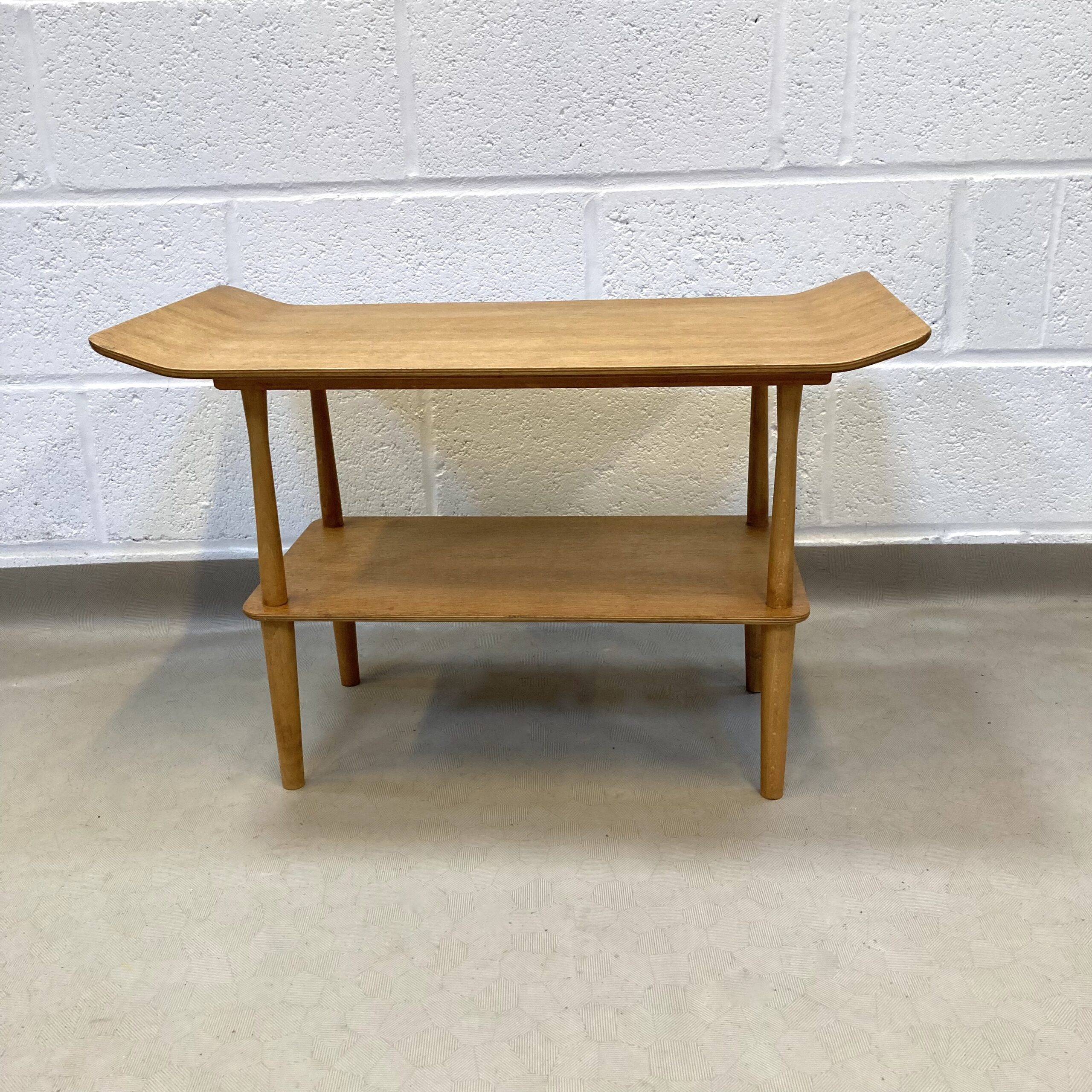 A 1950s mid century oak two tier coffee table