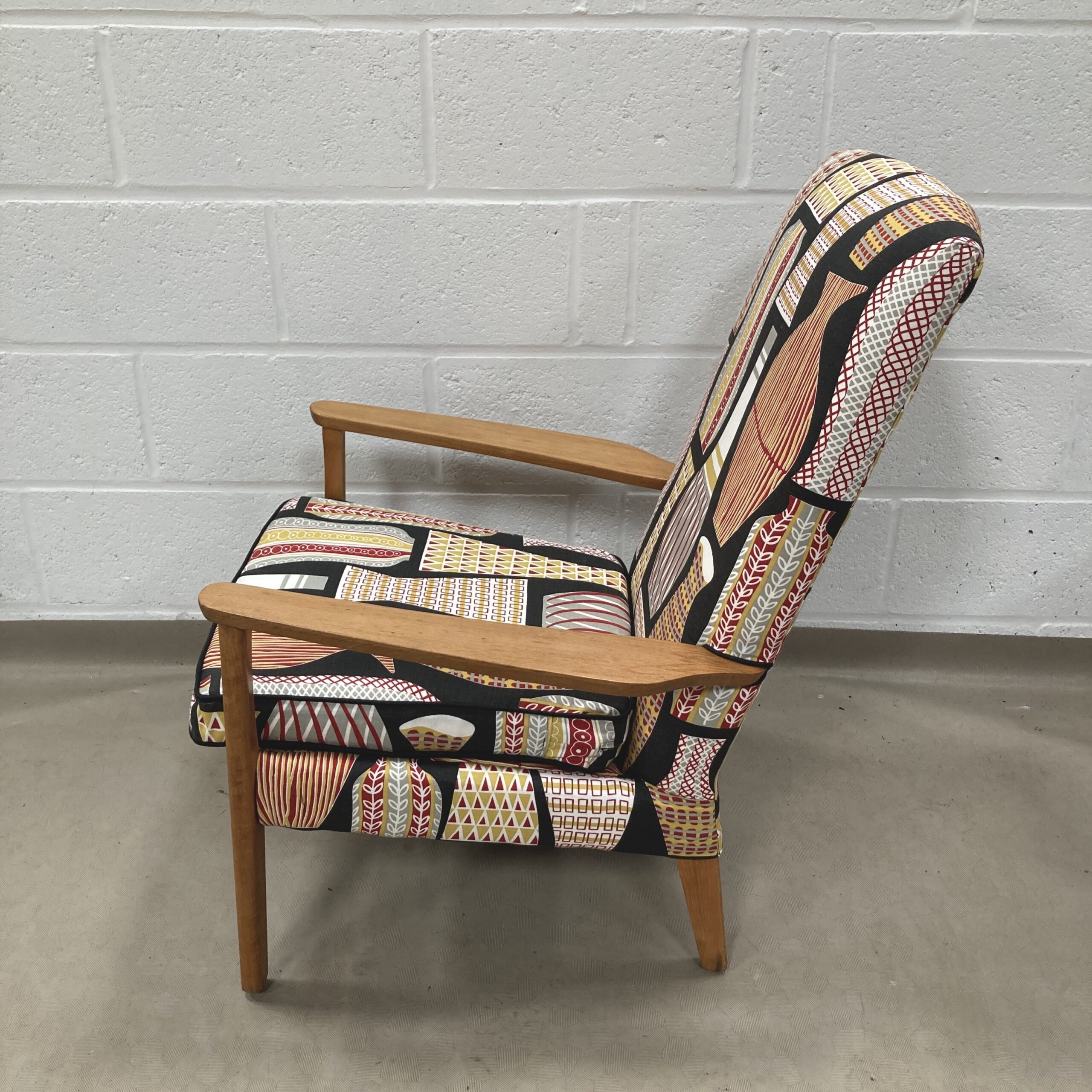 A 1960’s Parker Knoll chair recovered in sandersons Hayward (Black) - Image 3