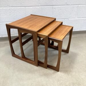 A nest of 1970's G Plan Quadrille of Teak Tables