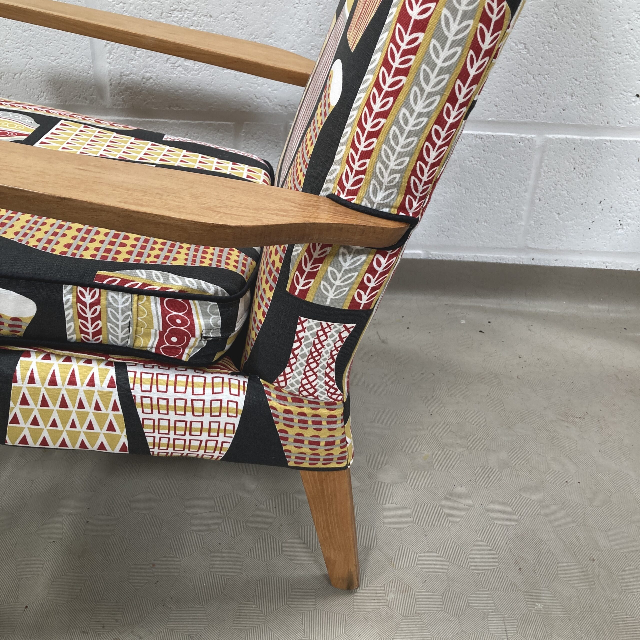 A 1960’s Parker Knoll chair recovered in sandersons Hayward (Black) - Image 2