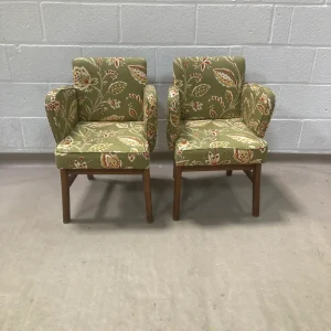 A pair of 1950’s arm/club chair in Collier Campbell Green Moresco fabric
