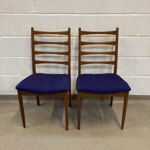 A pair of midcentury ladder back chairs