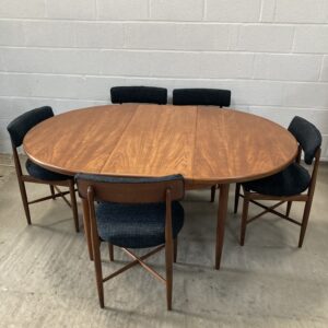 A 1960s G-plan fresco table and five Victor Wilkins designed Fresco chairs