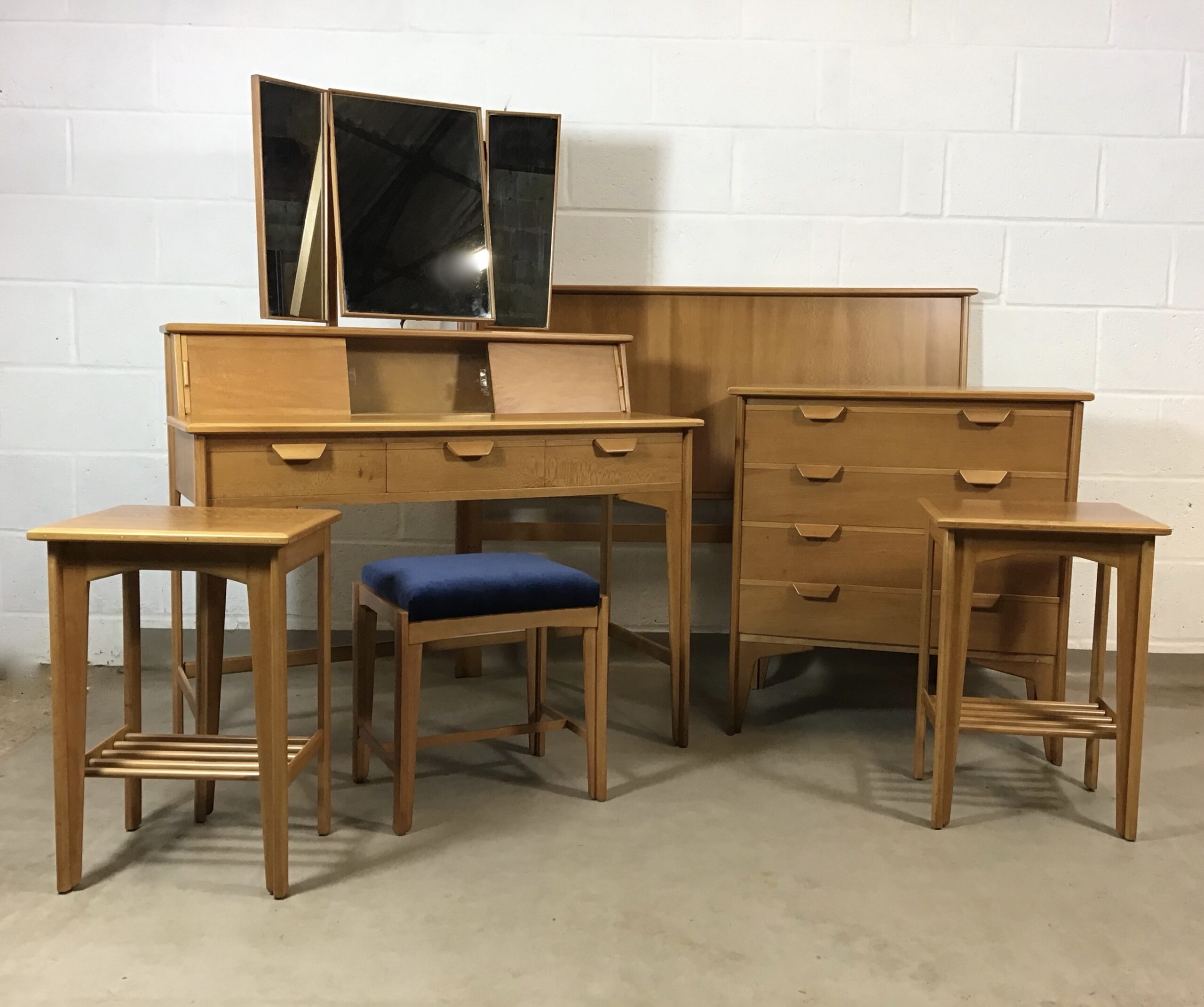 A Rare early 1950's Heals walnut and beech bedroom suite