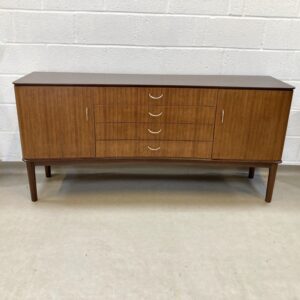 A 1960 Gordon Russell teak and Indian laurel sideboard pattern R810